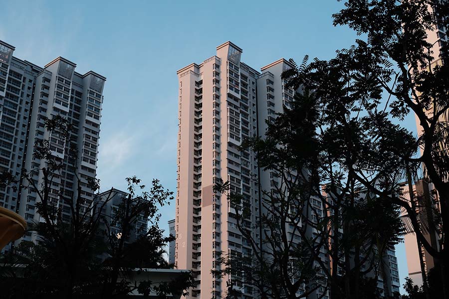 Singapore skyline with modern residential condominiums, illustrating rental yield considerations for new launch condos