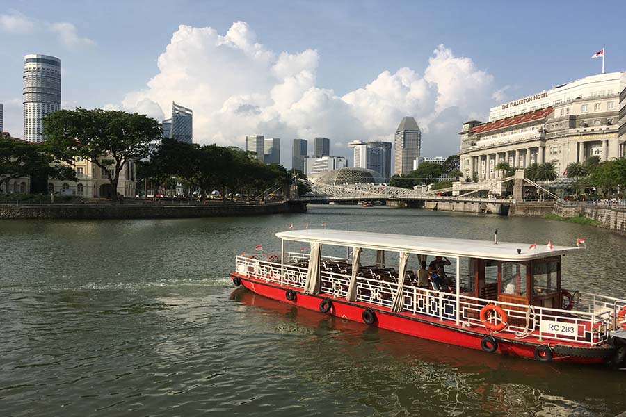 Singapore River cityscape illustrating central urban density and CCR–RCR property decision trade-offs