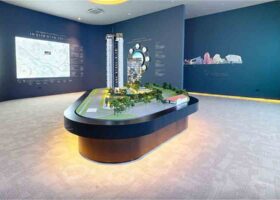 Bloomsbury Residences showflat scale model display showing development layout and surrounding Media Circle context