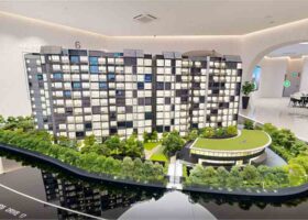 Norwood Grand showflat scale model illustrating block layout landscaping and facilities planning in Woodlands District 25