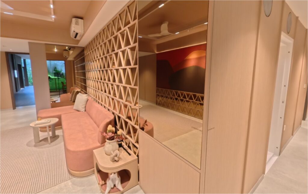 Promenade Peak showflat interior illustrating living and dining space within the Zion Road condominium development