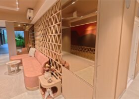 Promenade Peak showflat interior illustrating living and dining space within the Zion Road condominium development