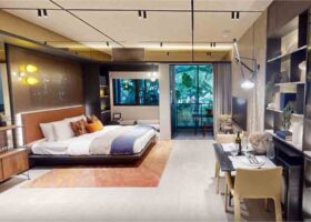 TMW Maxwell showflat bedroom layout with integrated study area, built-in storage, and balcony view